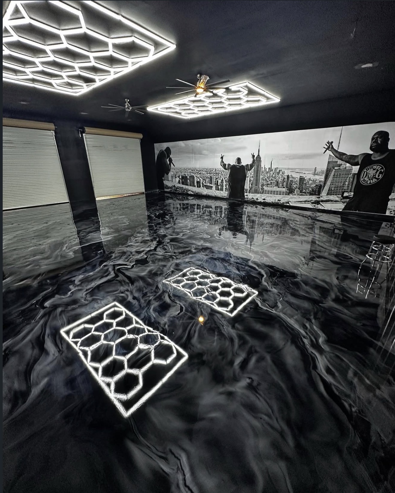 Black and silver metallic flake garage floor with hex lighting